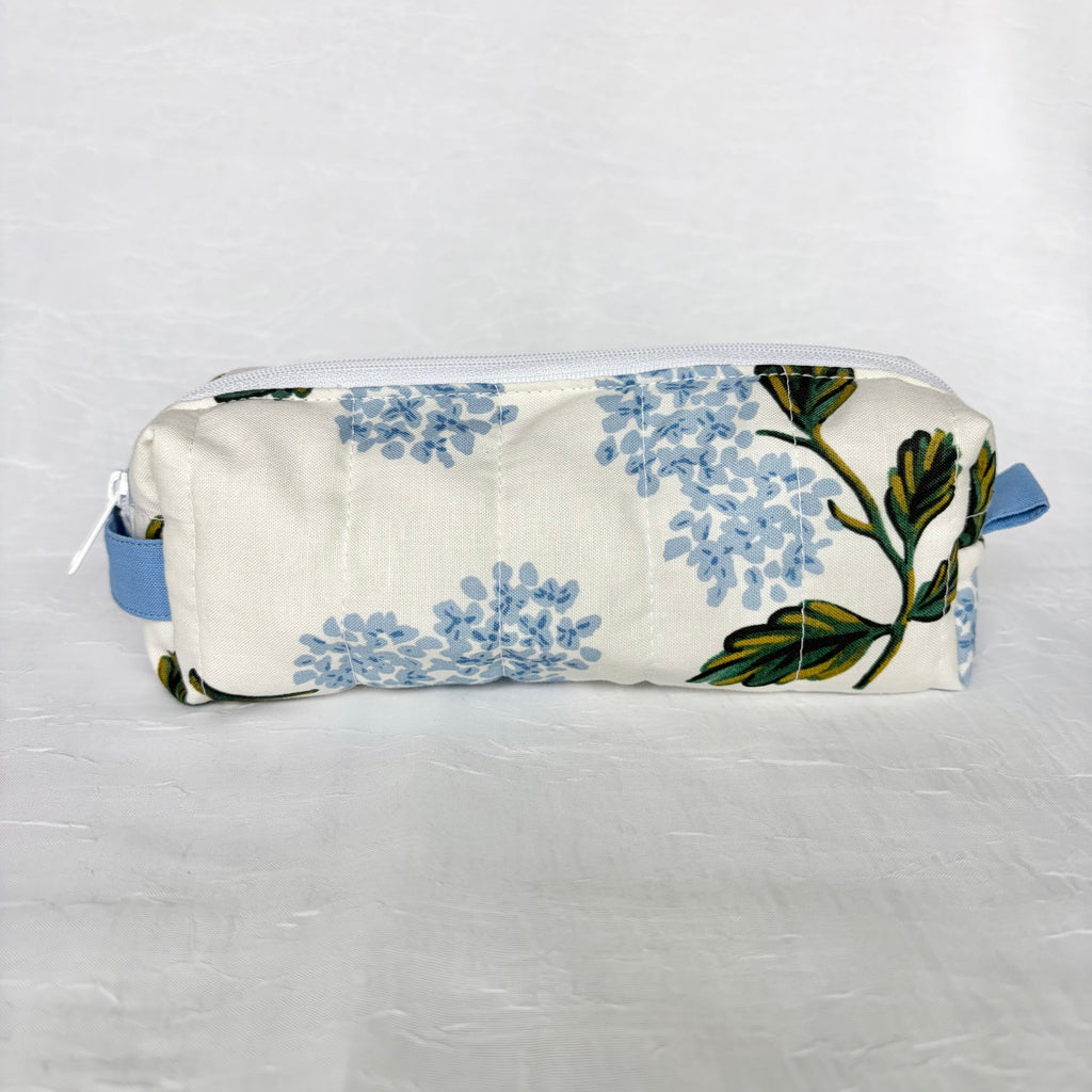 Blue Hydrangea-patterned pouch back view on white background
