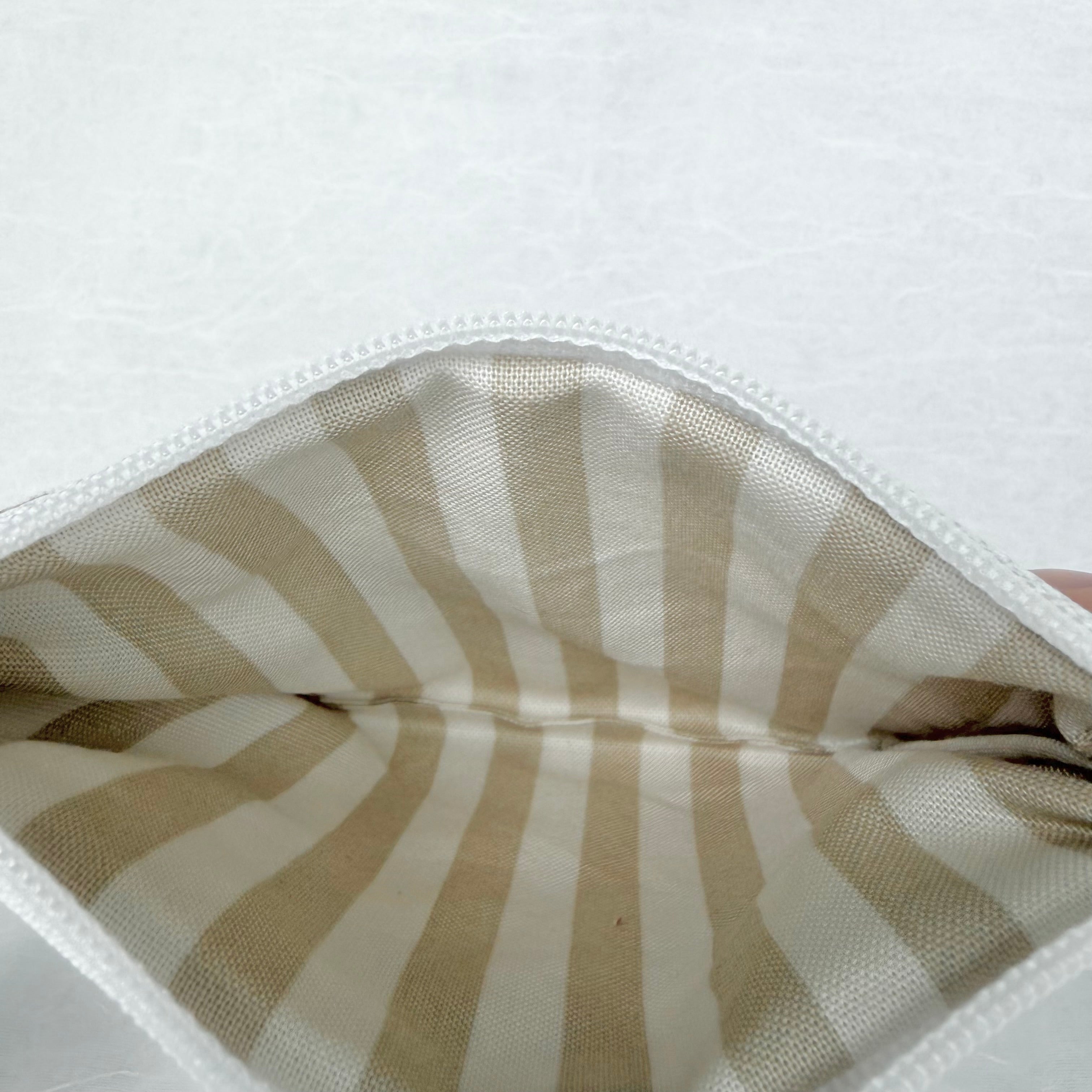 tan and cream vertical striped interior  on white background
