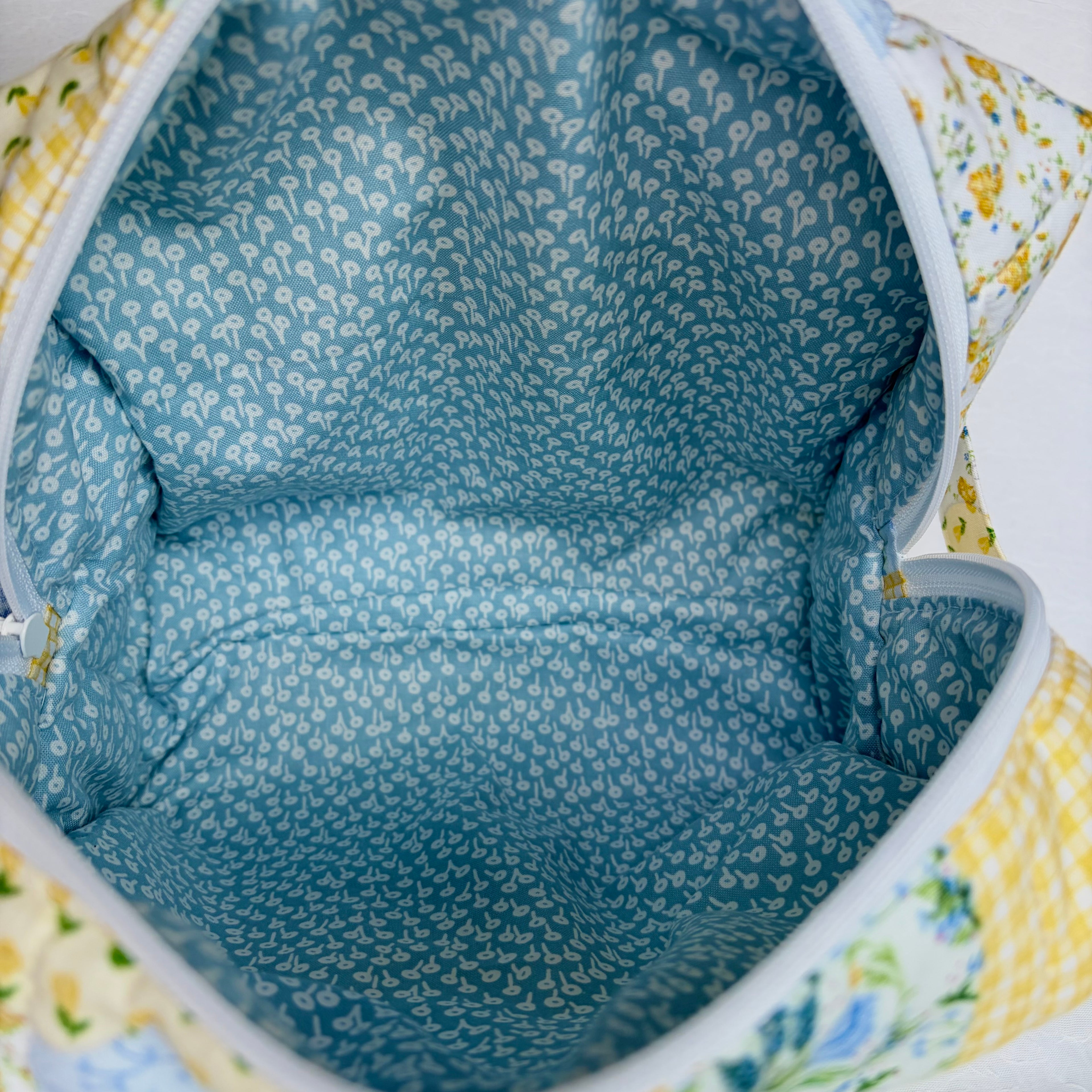 close up of blue interior with white flower design