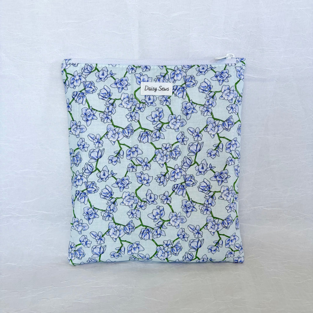 purple blue Floral-patterned fabric pouch on a white background