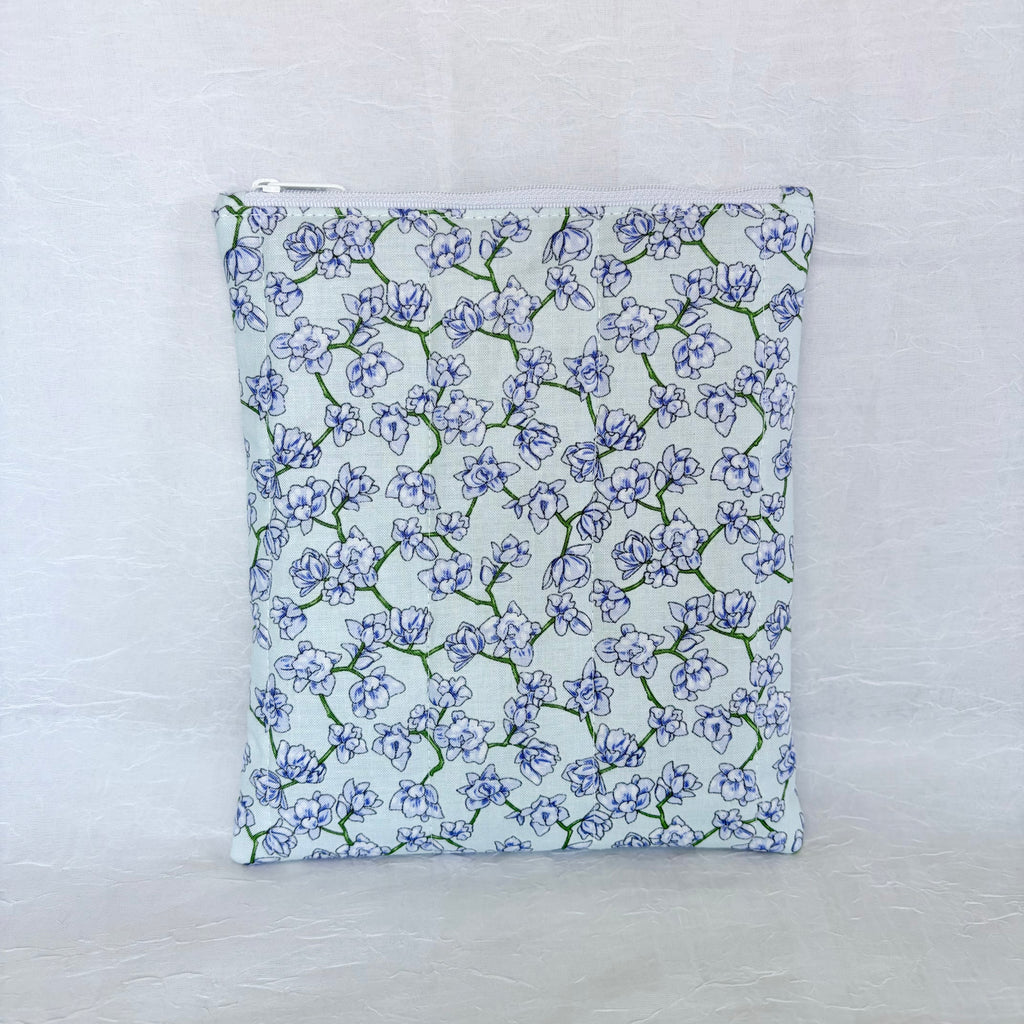 purple blue Floral-patterned pouch on a light gray background